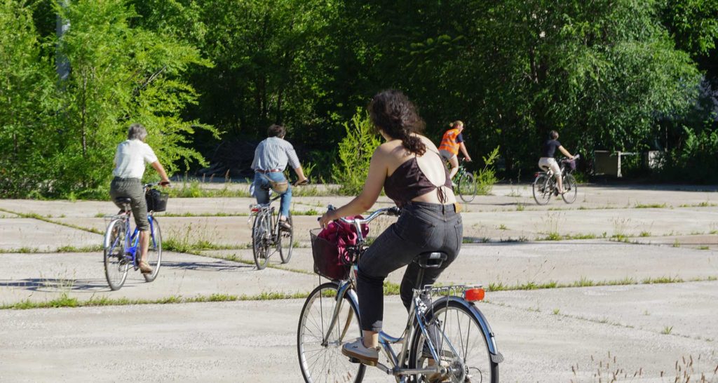 group of people on bicycle touring the area